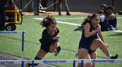 Decatur and Todd Beamer hurdlers leap over the hurdles. Ben Ray / The Mirror