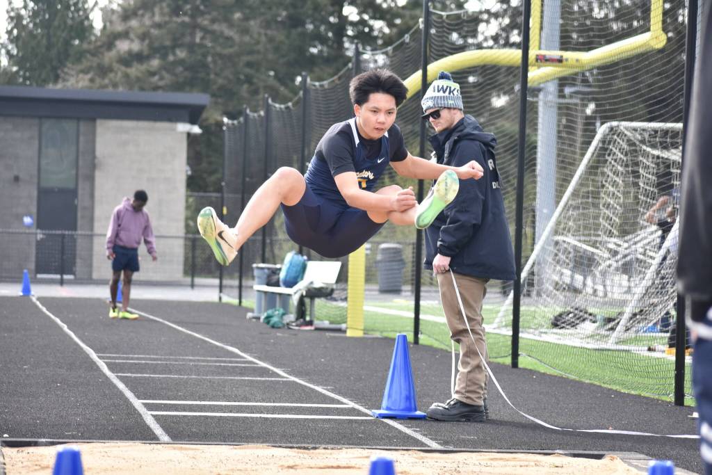 Decatur long jumper leaps into the sand pit. Ben Ray / The Mirror