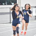 Decatur A 4 X 100 relay team preps for the hand off. Ben Ray / The Mirror