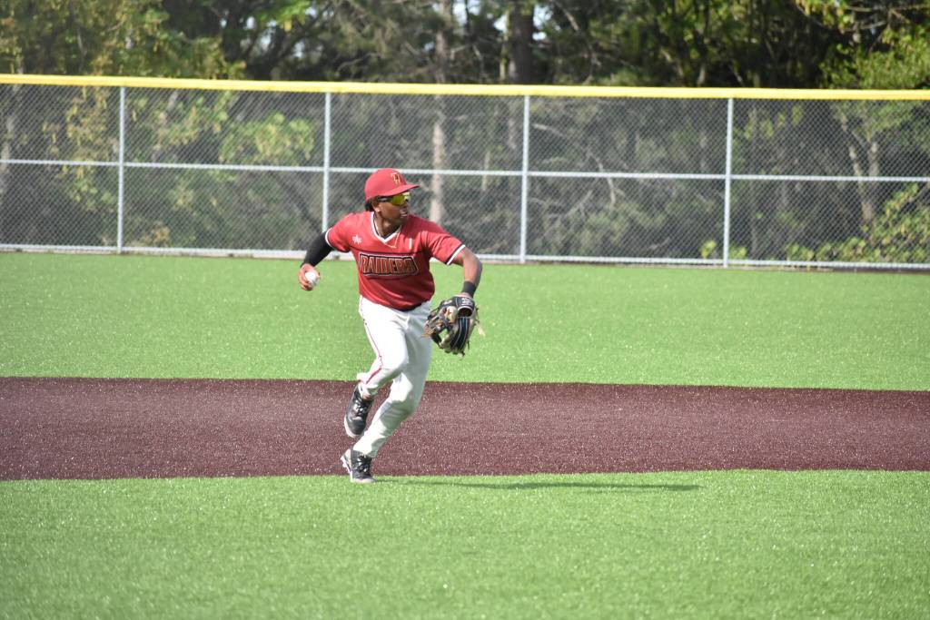 Kingston Edwards throws across the diamond for Thomas Jefferson. Ben Ray / The Mirror