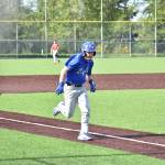Juda Westcott runs home for Federal Way. Ben Ray / The Mirror