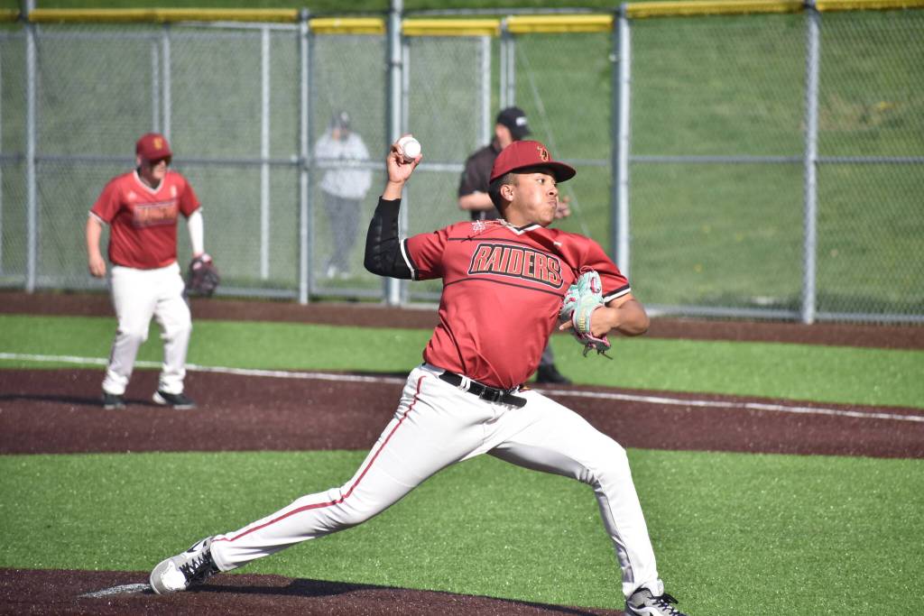 Uzziah Maldonado-Manzo pitches for Thomas Jefferson against Federal Way. Ben Ray / The Mirror