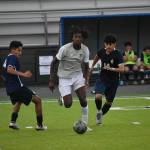 Johnny Thomas looks for a teammate to pass to for Decatur. Ben Ray / The Reporter