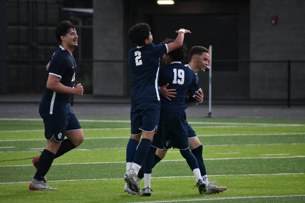 Israel Martinez is celebrated after scoring a go-ahead goal for Todd Beamer. Ben Ray / The Reporter