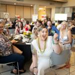 Photos by Crain Photography
Raffle drawings were part of the fun at DAWNs annual May It Forward fundraising gala May 2 at Renton Technical College.