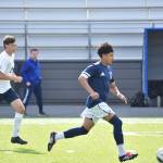 Adrian Alonso brings the ball up the field for Decatur against Bellarmine.
