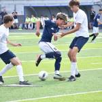 Photos by Ben Ray / The Mirror
Mason Manjares avoids two Bellarmine defenders.