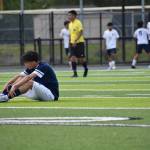 Jose Bonilla Ruiz sits on the ground following Bellarmines third goal.