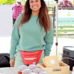 Erica Pulley of Es Apothecary selling infused honey, teas and more at the Federal Way Farmers Market. Photo by Keelin Everly-Lang / the Mirror