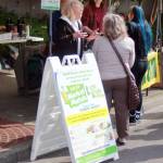 The farmers market information table shares information about food access options. Photo by Keelin Everly-Lang / the Mirror