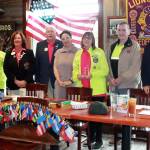 From left to right: Federal Way Lions Club president Erik Scott, Lions 19N District Governor Donna Murr, District 19 Council Chair Steve Brooks, representative from CareNet Farnoush Katouzian, award winner Barbara Fey, Lions International Director A.D. Don Shove, Lions Zone Chair of N-4 Leanne Guier. 
Photo by Keelin Everly-Lang / the Mirror.