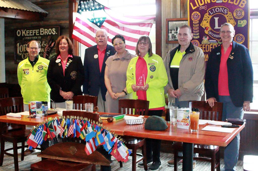 From left to right: Federal Way Lions Club president Erik Scott, Lions 19N District Governor Donna Murr, District 19 Council Chair Steve Brooks, representative from CareNet Farnoush Katouzian, award winner Barbara Fey, Lions International Director A.D. Don Shove, Lions Zone Chair of N-4 Leanne Guier. 
Photo by Keelin Everly-Lang / the Mirror.