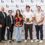 Callie Moore (left) and Ethan Flavel (right) stand beside John Yellam (far left), FWPS Superintendent Dr. Dani Pfeiffer (second from left) and Federal Way Mirror Reporter Ben Ray (far right). Photo provided by FWPS.