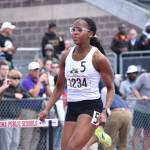 Chloe Williams of Kentridge runs in the 300 hurdle race. Ben Ray / Sound Publishing