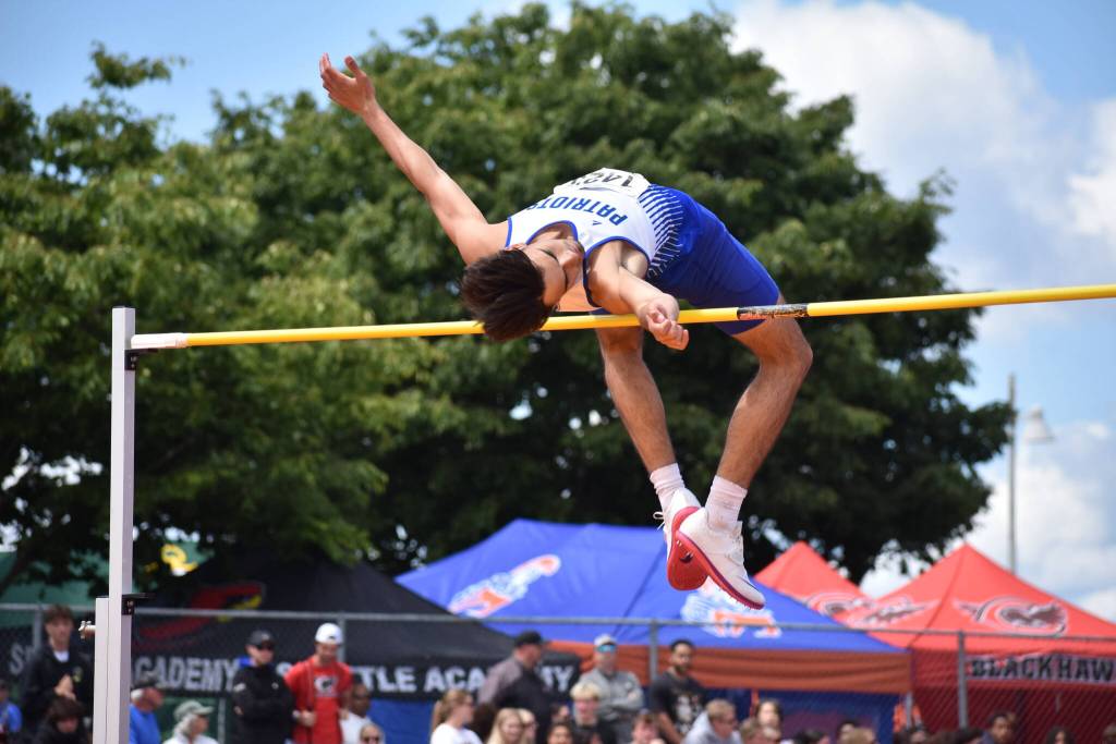 Oden Hatcher gets over the bar for Liberty. Ben Ray / Sound Publishing