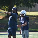 Evan Cook points during Decatur practice during a walk through portion of practice. Ben Ray / The Mirror