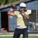 Decatur QB Antoine Williams makes a pass at practice. Ben Ray / The Mirror
