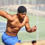 Kaicen Carter runs up a hill for Federal Way. Ben Ray / The Mirror